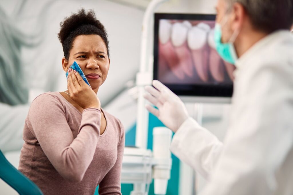 Patient receiving care from an Emergency Dentist in Chelmsford for severe tooth pain
